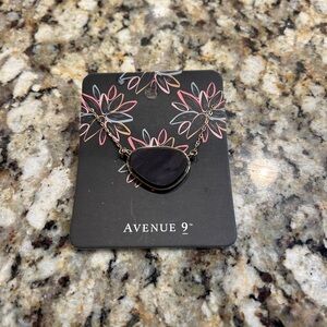 Statement or layering necklace in black and gold. NWT